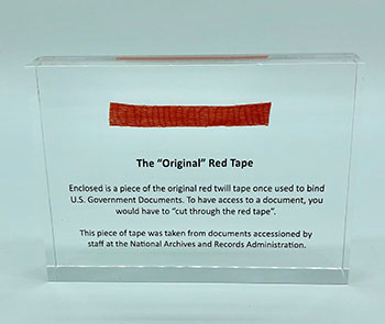 Red Tape Paperweight